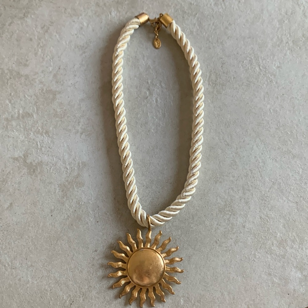 Zara sun pendant on silky rope necklace.